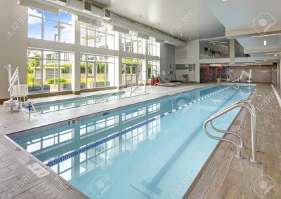 Swimming pool in luxurious apartment building.