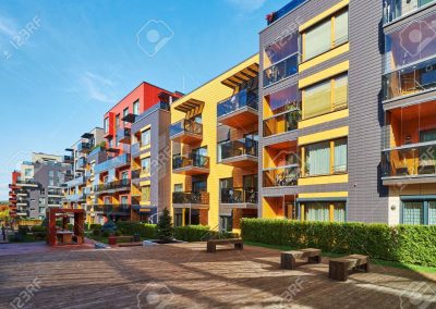 Benches at modern complex of residential buildings